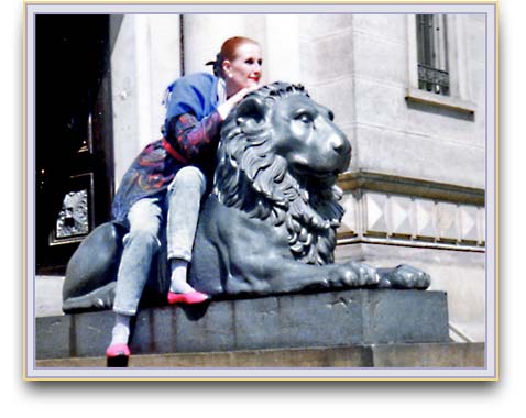 Ulrike sitting on old cast iron lion.
