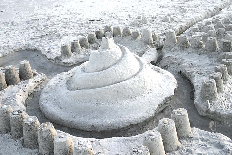 A sandcastle seemingly made from sugar.